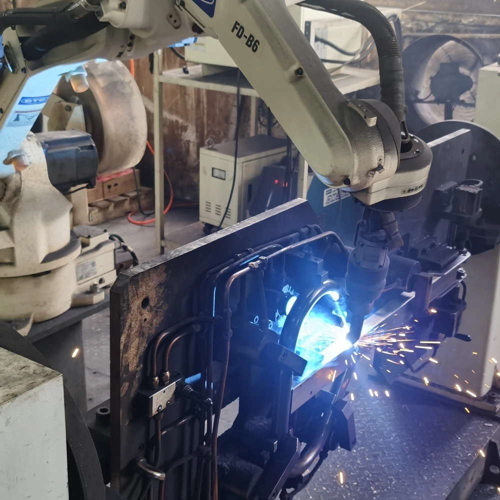 Welding by Robots.jpg Welding by Robots.jpg